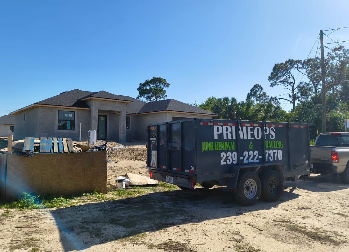 Prime Ops Hauling trailer on a Naples, FL construction job site